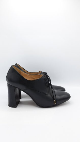 Derbies à talons de seconde main