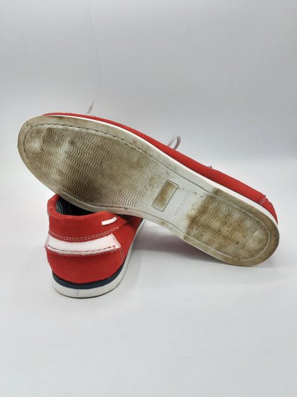 Chaussures bateau KNK rouges de seconde main